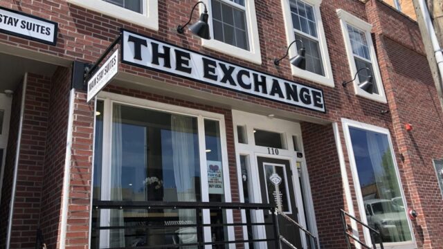 Exterior of The Exchange by Park House in Parkville, MO, featuring modern design set along Parkville’s historic streets.